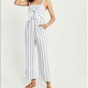 a blue and white striped jumpsuit